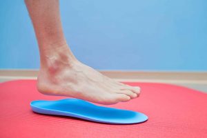 foot stepping on custom orthotics in Melbourne